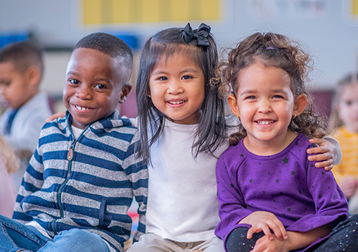 Three kids smiling